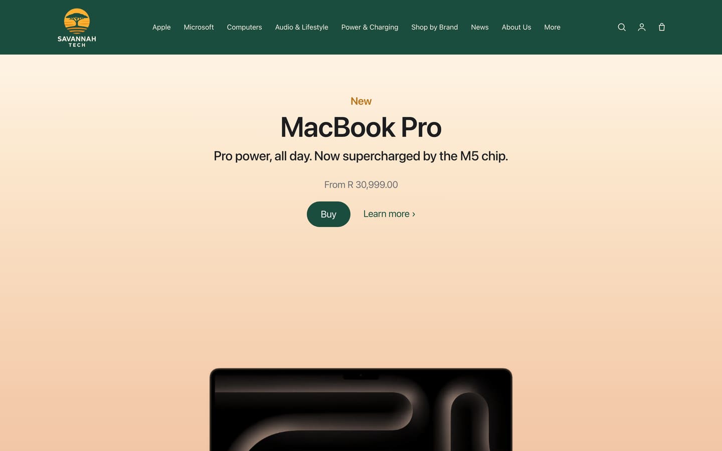 The Savannah Tech storefront homepage, showing the brand navigation across Apple, Microsoft, computers and audio, with a featured product hero.